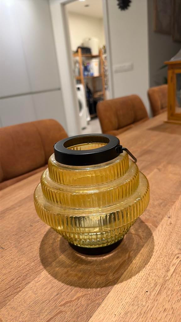 Lantaarn in glas met zwarte rand, Ophalen