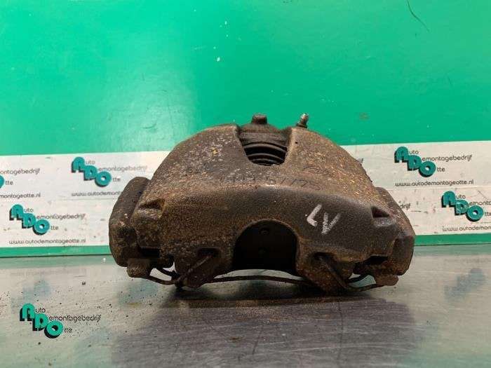 Remklauw (Tang) links-voor van een Opel Astra (Astra H 04-), Gebruikt, -, -, Opel