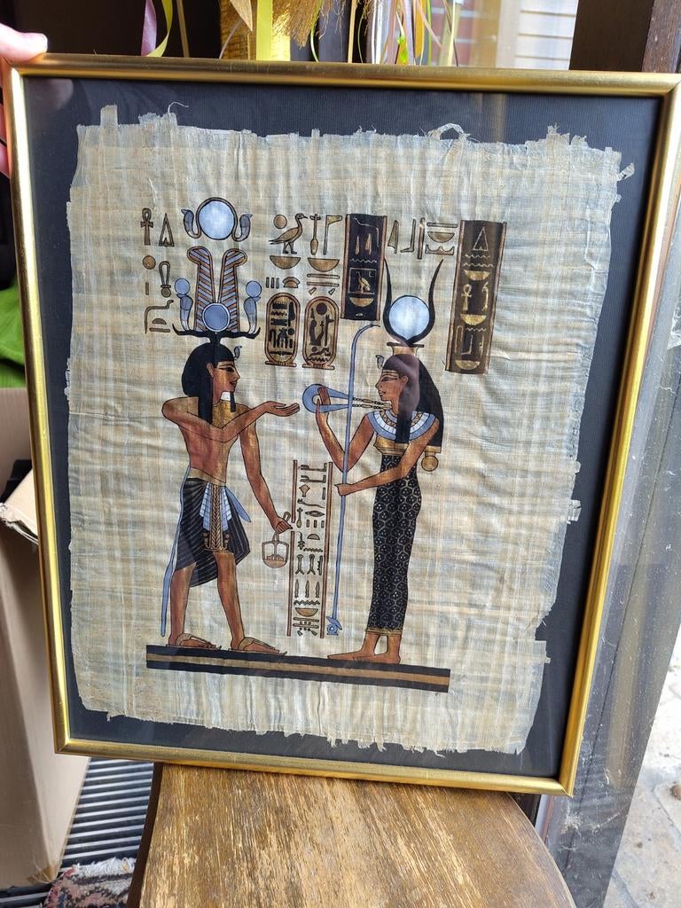 Ingekaderde Egyptische papyrus, Ophalen