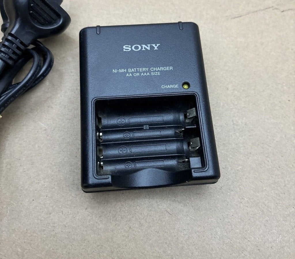 Sony BC-CS2B est un chargeur de batteries, TV, Hi-fi & Vidéo, Enlèvement ou Envoi