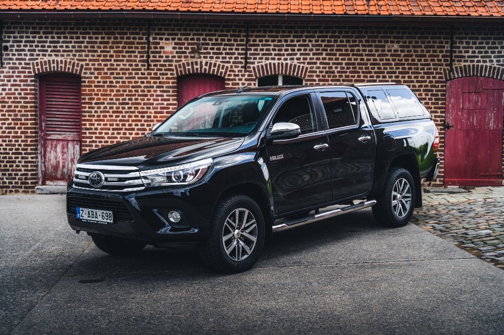 Toyota Hilux 2.4D Lounge, Autos, Toyota, Cuir, Entreprise, Noir, 5 portes