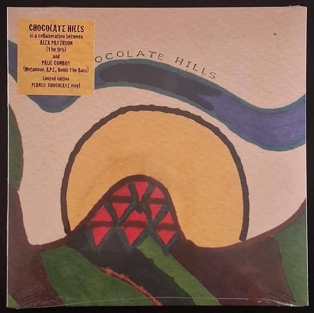 LP Chocolate Hills - Yarns From The Chocolate Triangle (New), Cd's en Dvd's, Ophalen of Verzenden, Nieuw in verpakking, 12 inch