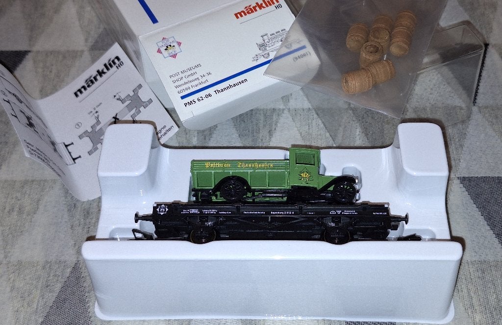 Märklin HO 94061 Lageboordwagen met vrachtwagen van de DB, Hobby en Vrije tijd, Modeltreinen | H0, Zo goed als nieuw, Wagon, Märklin