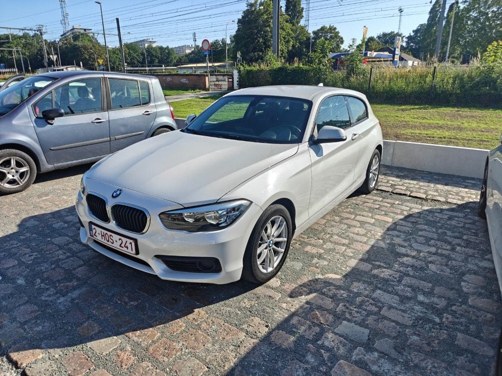 BMW 116i 2015, Autos, BMW, Particulier, Série 1, Intérieur cuir, Essence, Euro 6, Coupé, 3 portes, Boîte manuelle, Blanc, Noir