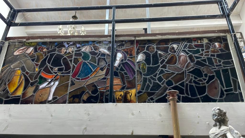 Glasraam met breughel tafereel, Ophalen