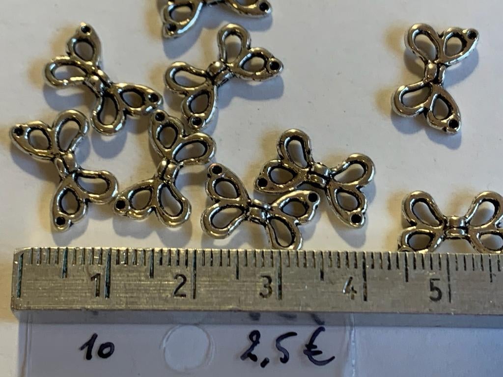 10 metalen tussenstukjes vlinder, Ophalen of Verzenden, Nieuw, Tussenstuk of Tussenkraal