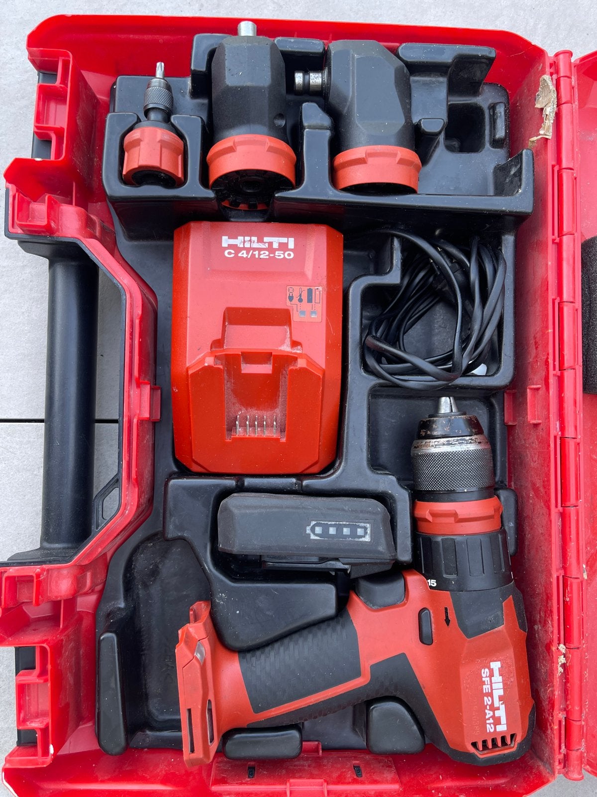 HILTI SFE 2-A12 4-kops batterij en oplader, Ophalen of Verzenden, Zo goed als nieuw, Boormachine
