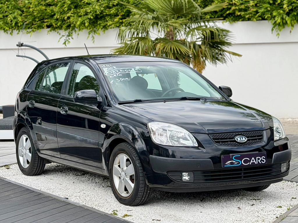 Kia rio 1.4i ** 082.000 km ** Airco **, Auto's, Kia, Voorwielaandrijving, 4 cilinders, Zwart, Bedrijf