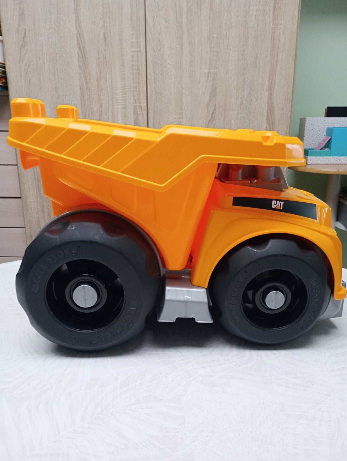 Grand camion benne CAT Mega Bloks, Ophalen
