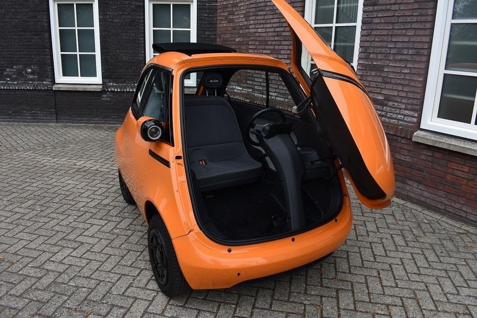Microlino Competizione Competizione 10.5 kWh (90km/u) Wij zi, Auto's, Overige Auto's, Automaat, 177 km, 11 kWh, Open dak