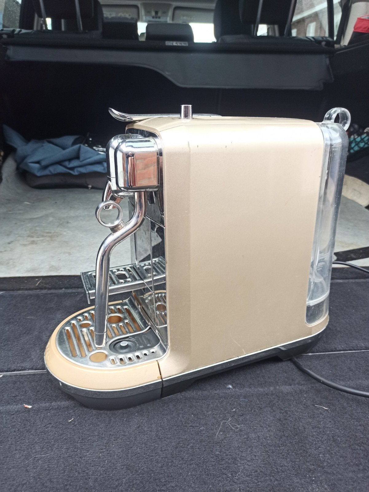 Koffie machine Nespresso, Ophalen