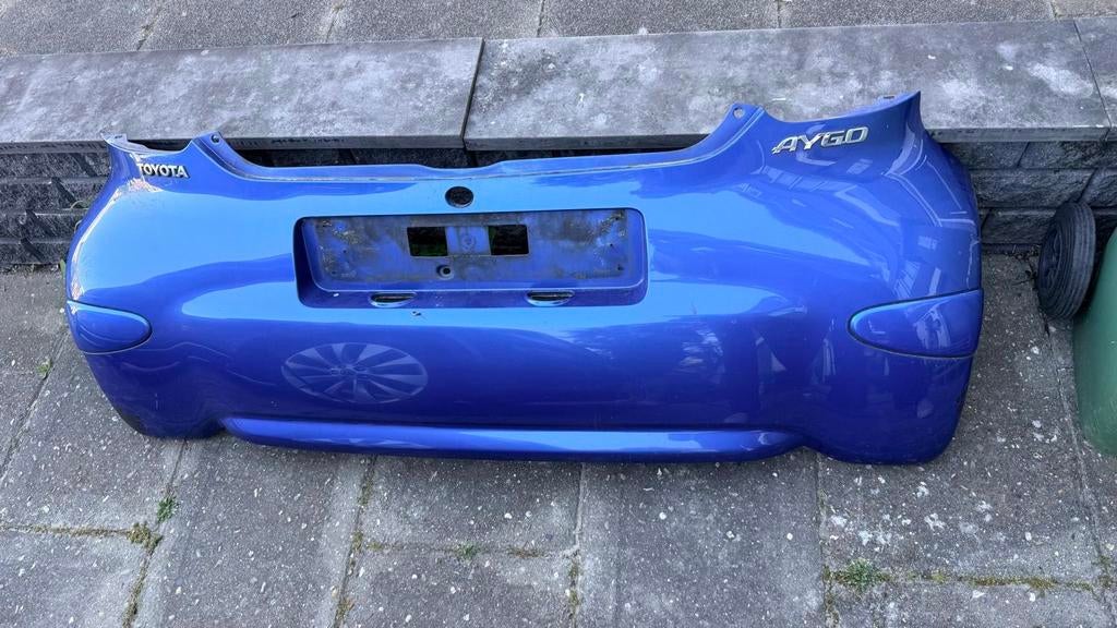 Toyota Aygo Achterbumper Blauw 8U7 - Gebruikt, Enlèvement, Arrière, Toyota, Pare-chocs