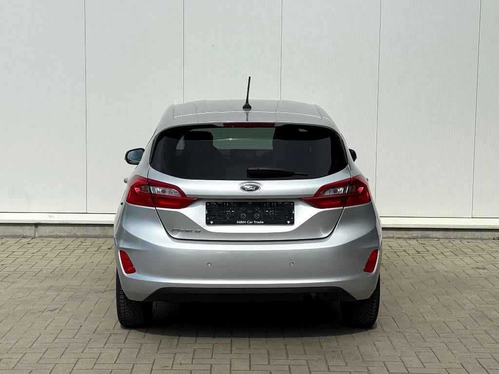 ✅ Ford Fiesta  1.1i GARANTIE 1.Eig LaneAssist Parksens Airco, Auto's, Voorwielaandrijving, Stof, 62 kW, Bedrijf