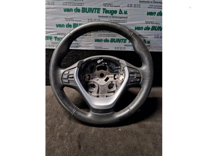 Volant d'un BMW 1-Serie, -, 3 mois de garantie, Utilisé, -