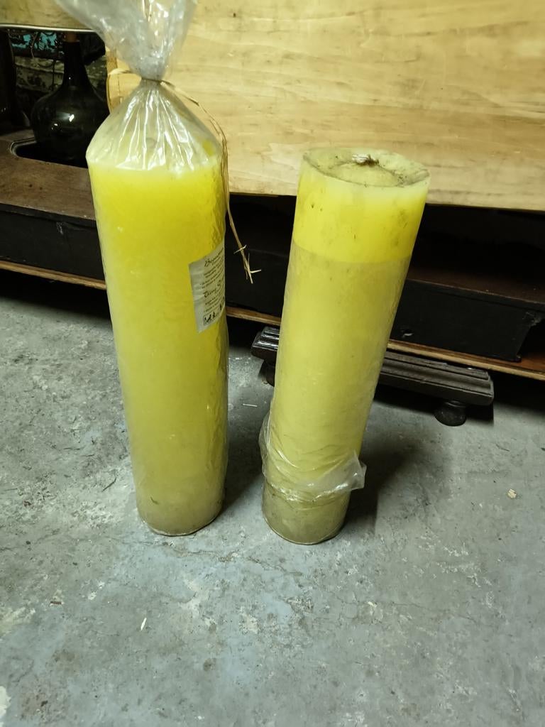 2 grote kaarsen, Ophalen
