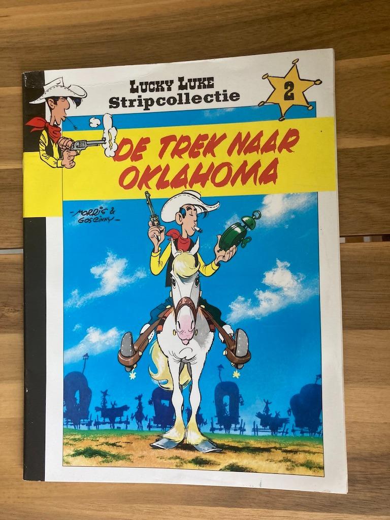 Strip Lucky Luke De trek naar Oklahoma van Morris Goscinny, Eén stripboek, Ophalen of Verzenden, Zo goed als nieuw, Morris&Goscinny