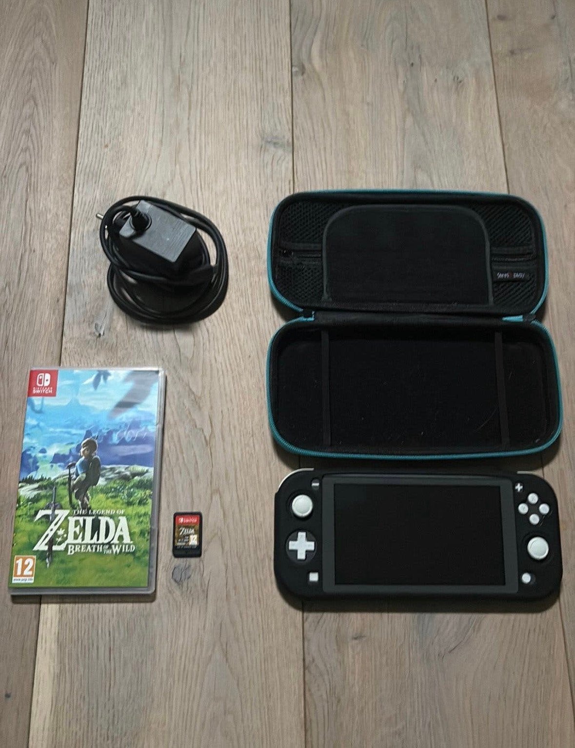 Switch Lite + Zelda Breath of the Wild + Beschermtas, Games en Spelcomputers, Ophalen, Grijs, Met beschermhoes of tas