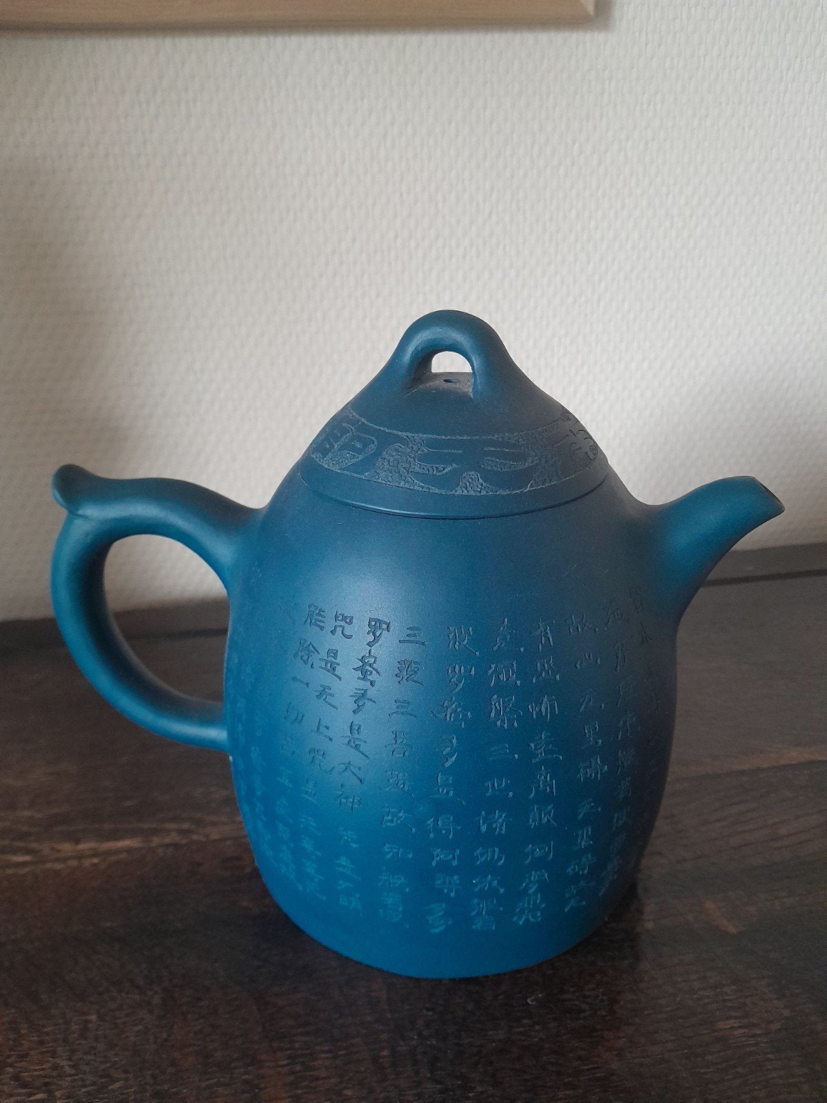 Théière chinoise argile yixing, Enlèvement