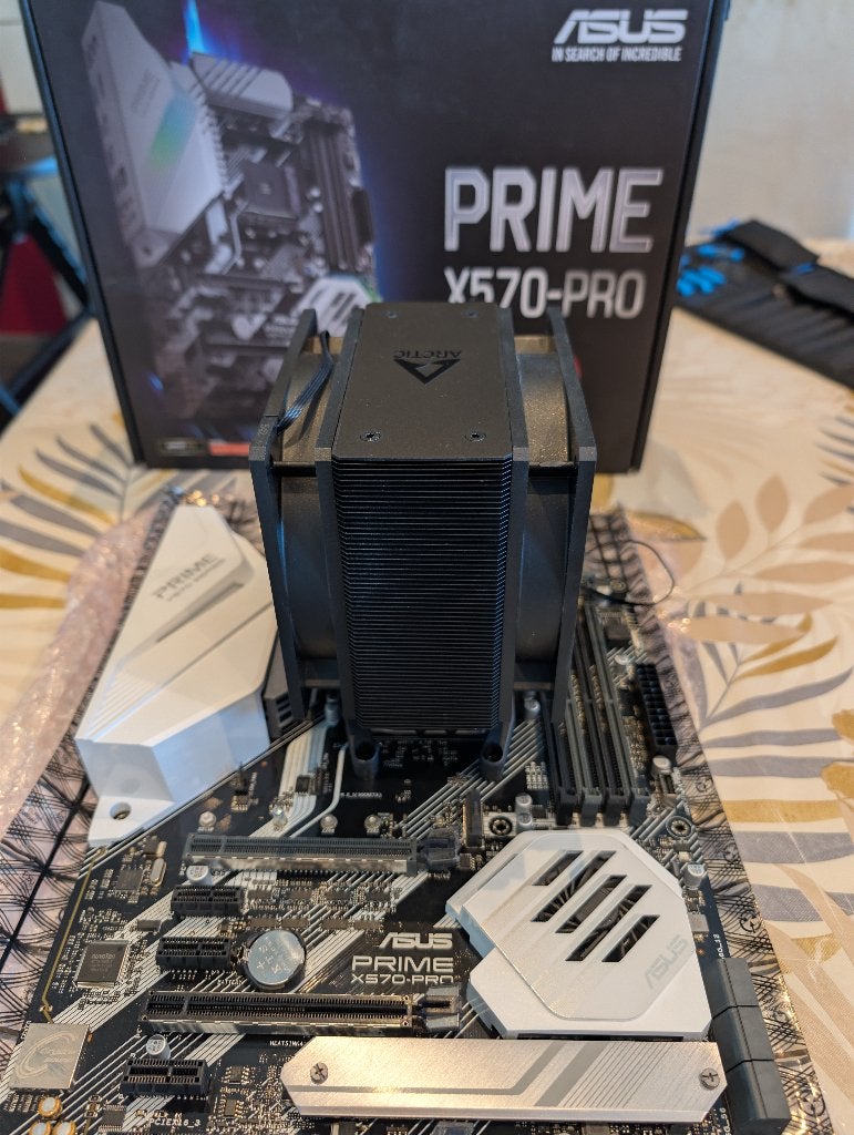 Combo Asus X570-Pro + Ryzen 7 5700X + Arctic Freezer 36, Enlèvement ou Envoi, DDR4, Utilisé, Socket AM4