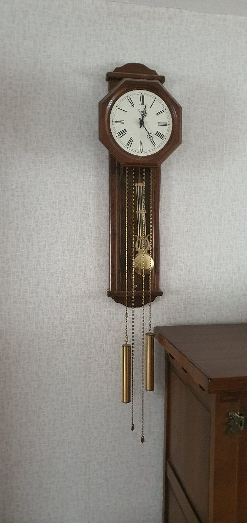 Warmink wandklok met slinger en gewichten, Ophalen