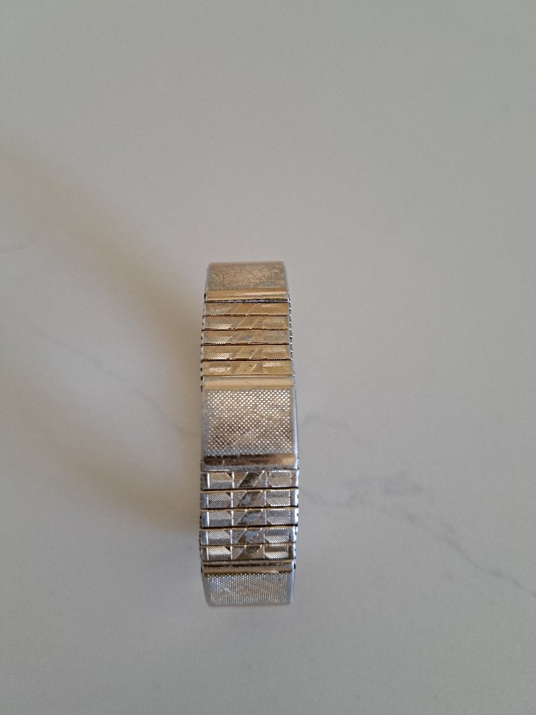 Bracelet vintage Aimante Santa-flex, Bijoux, Sacs & Beauté, Enlèvement ou Envoi, Comme neuf, Argent, Acier