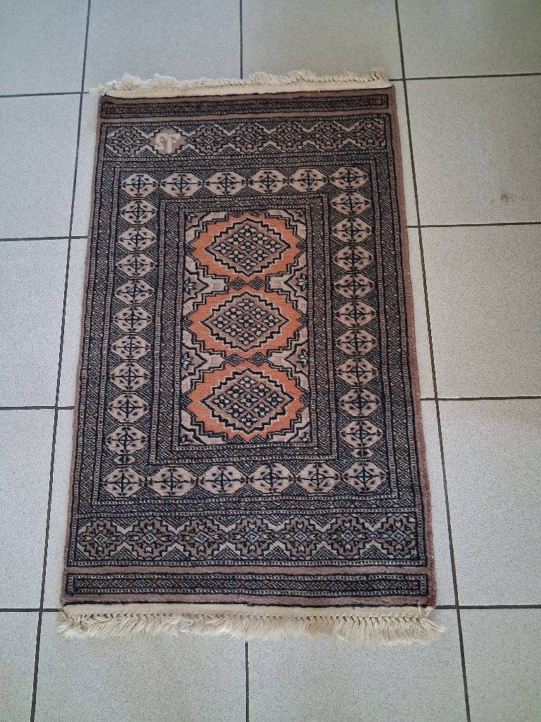 tapijt pakistan handgeknoopt, Ophalen