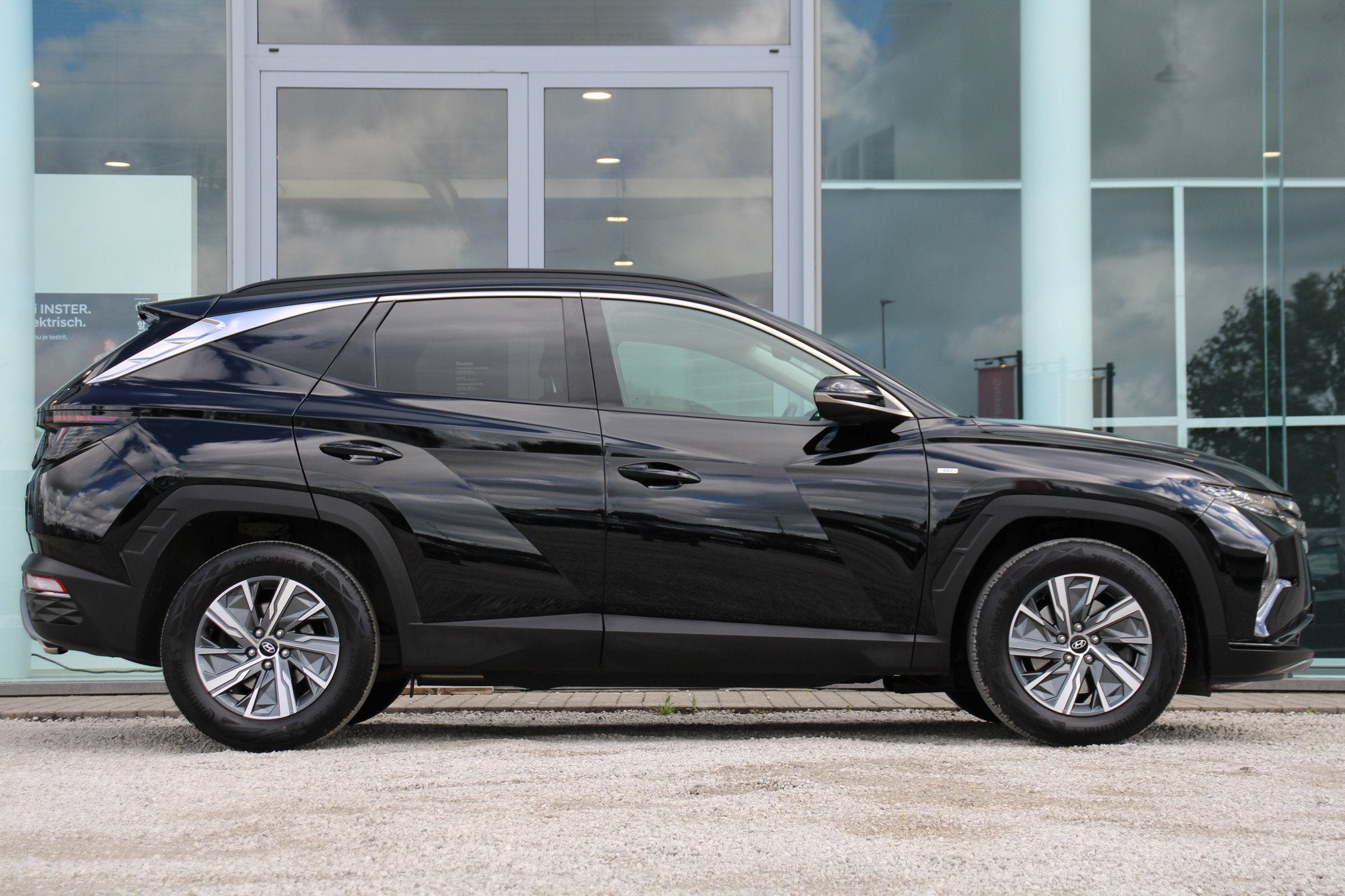 Hyundai Tucson 48V 1.6T MHEV Feel Automaat *CAM*NAVI*GARANTI, Entreprise, Carnet d'entretien, Noir, 5 portes