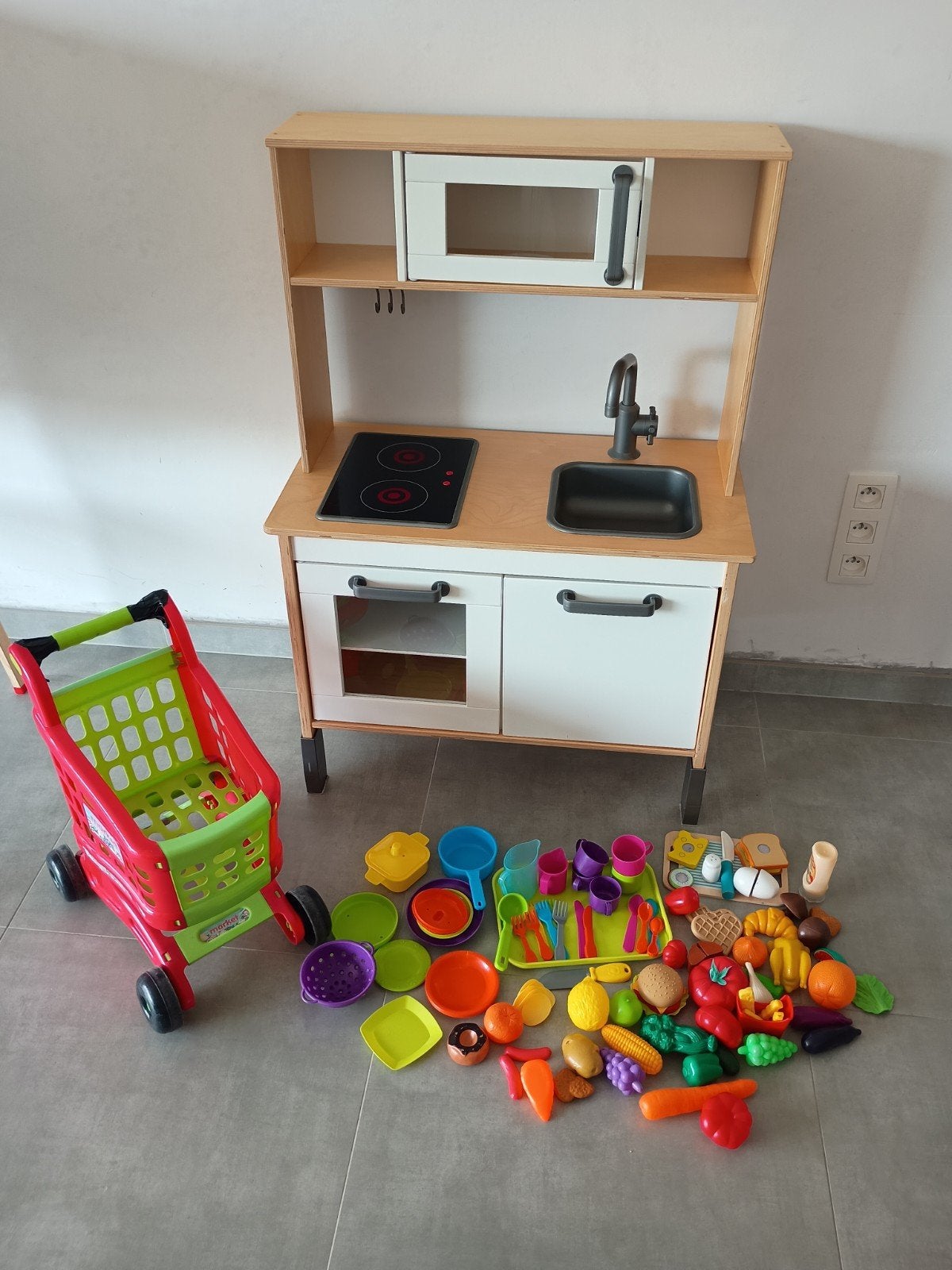 Keukentje met toebehoren en winkelkarretje, Enlèvement