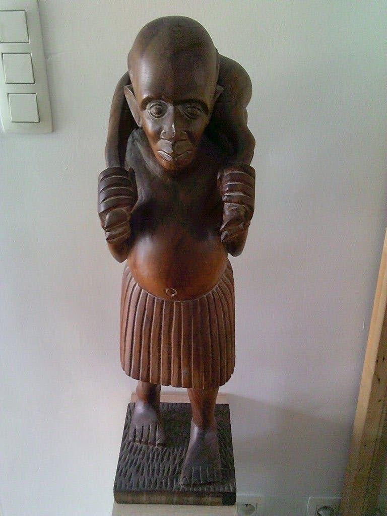 Afrikaans oud beeld in hout ., Enlèvement, Bois, Statue