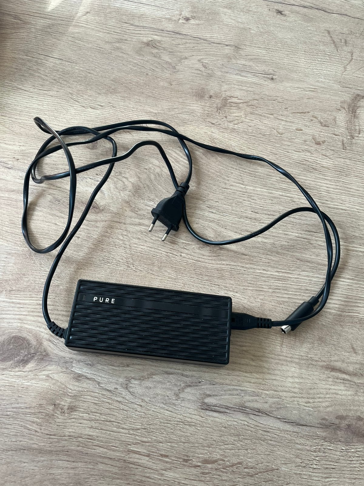 Oplader voor step Pure, Ophalen, Zo goed als nieuw