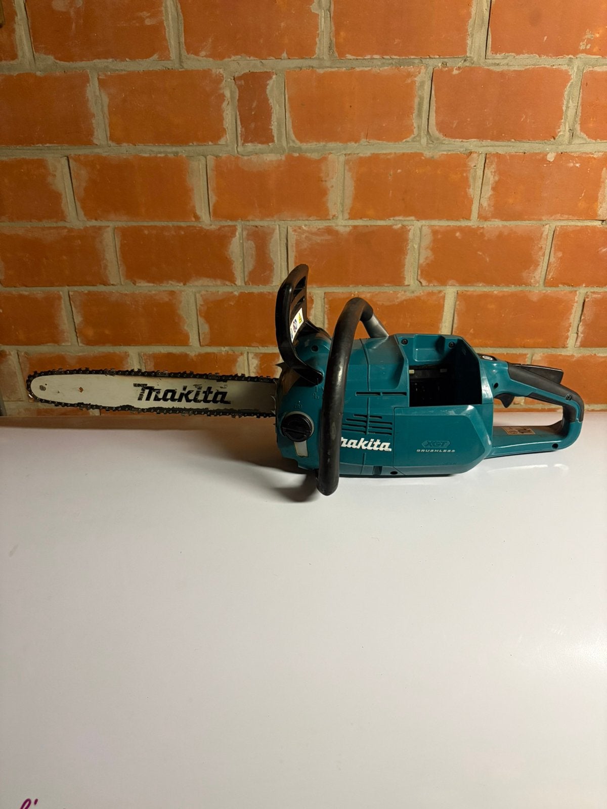 Makita XGT 40V kettingzaag UC012GZ 40cm, Ophalen of Verzenden, Gebruikt