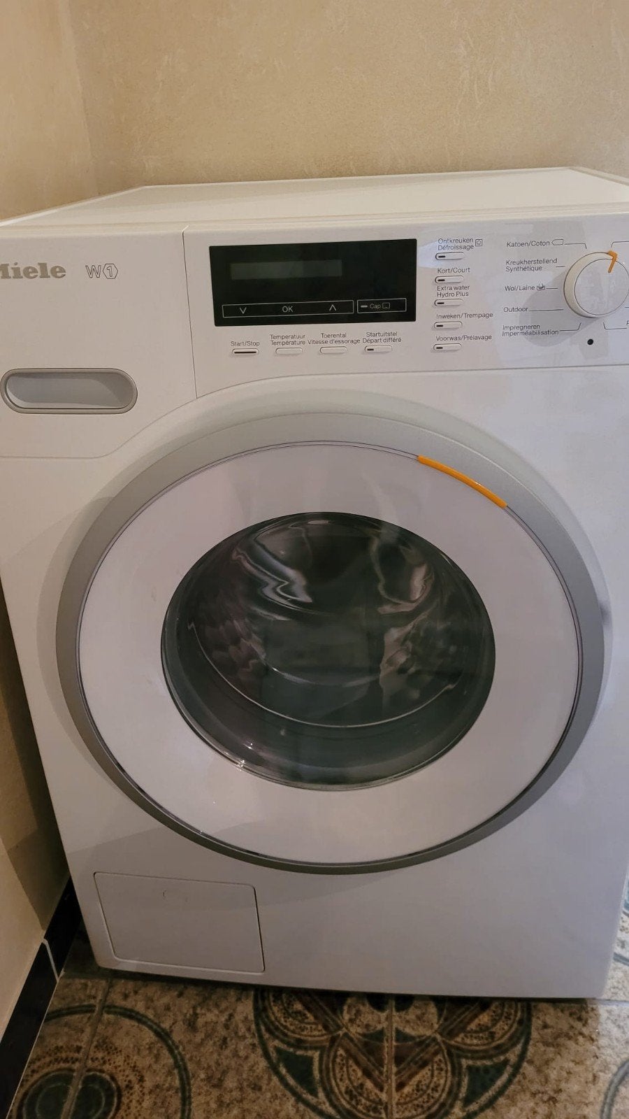 Miele wasmachine, Enlèvement