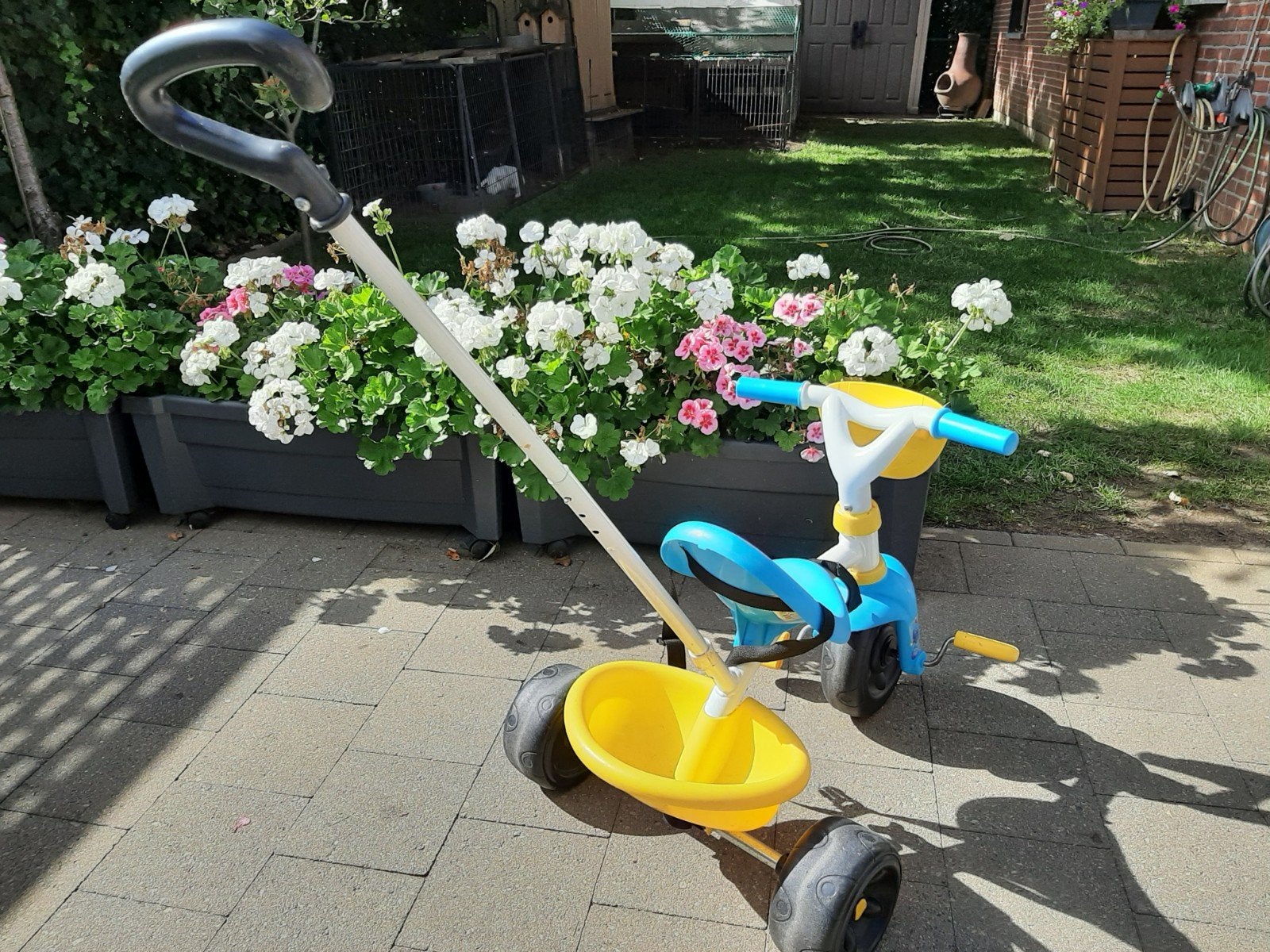 tricycle avec poussoir et ceinture de marque Smoby, Enlèvement, Comme neuf, Véhicule à pousser
