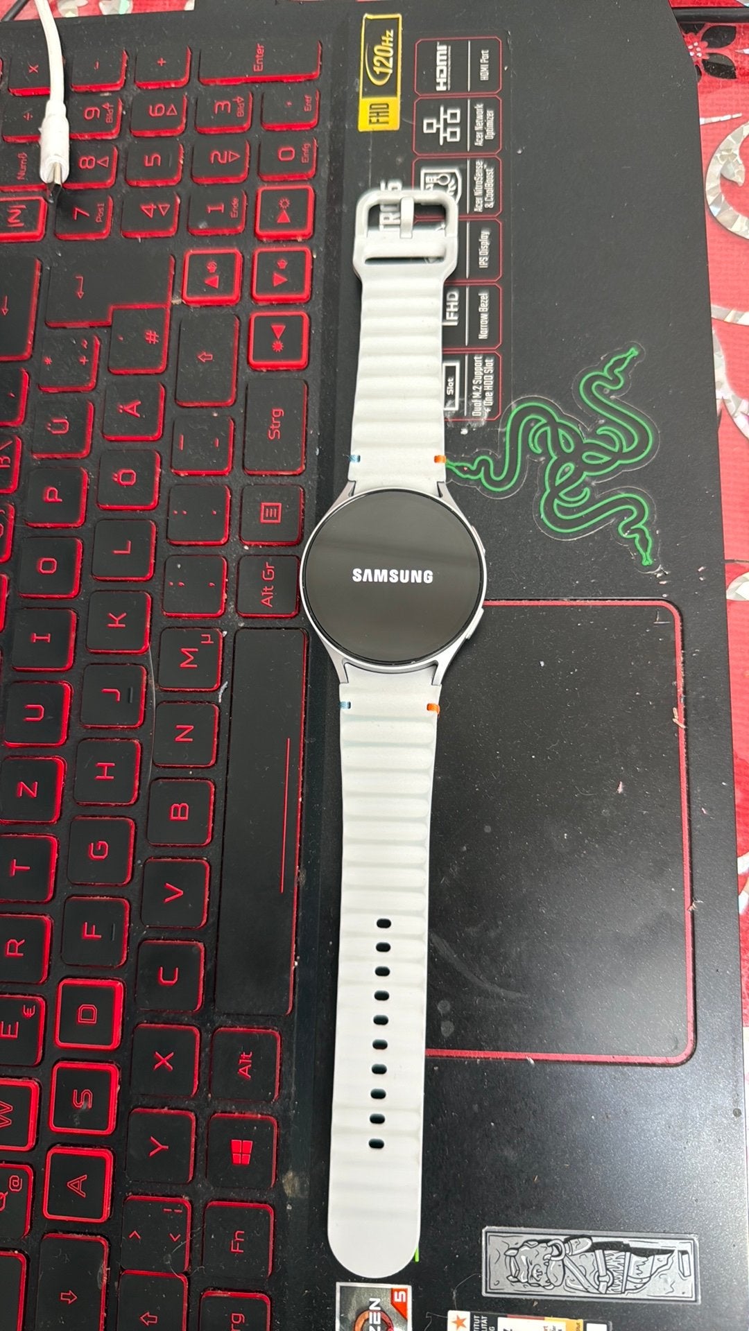 Smartwatch samsung galaxy 7, Ophalen, Zo goed als nieuw, Oranje