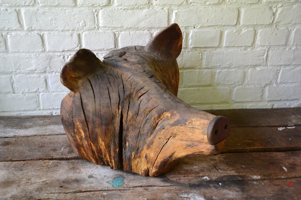 houten knoest beeld, Ophalen