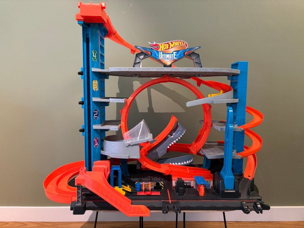 Hotwheels pakket: Ultimate Garage, 3 transporters + racebaan, Kinderen en Baby's, Ophalen of Verzenden, Gebruikt