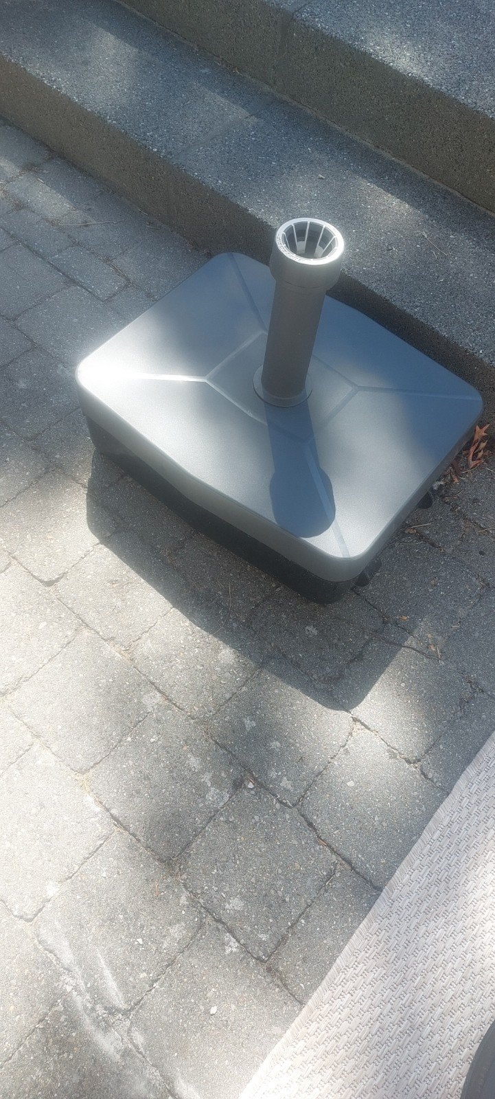 Parasol + voet, Ophalen