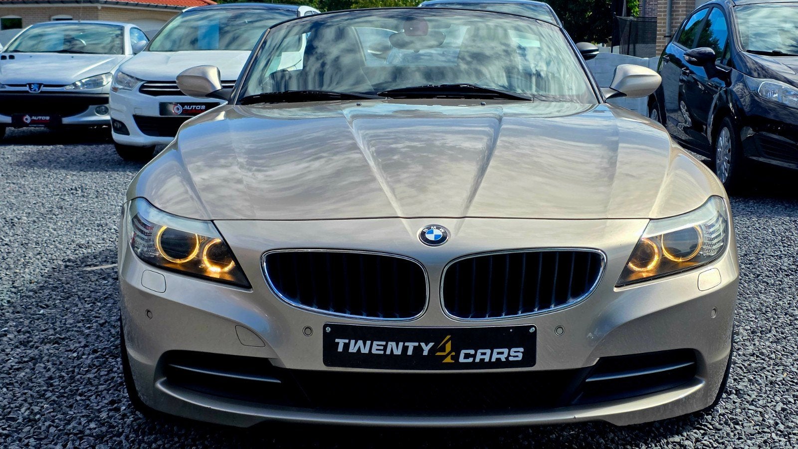 BMW Z4 Benzine 204Pk ParkeerS Cabrio Airco CruiseC, Auto's, Zwart, 2497 cc, Cabriolet, Beige