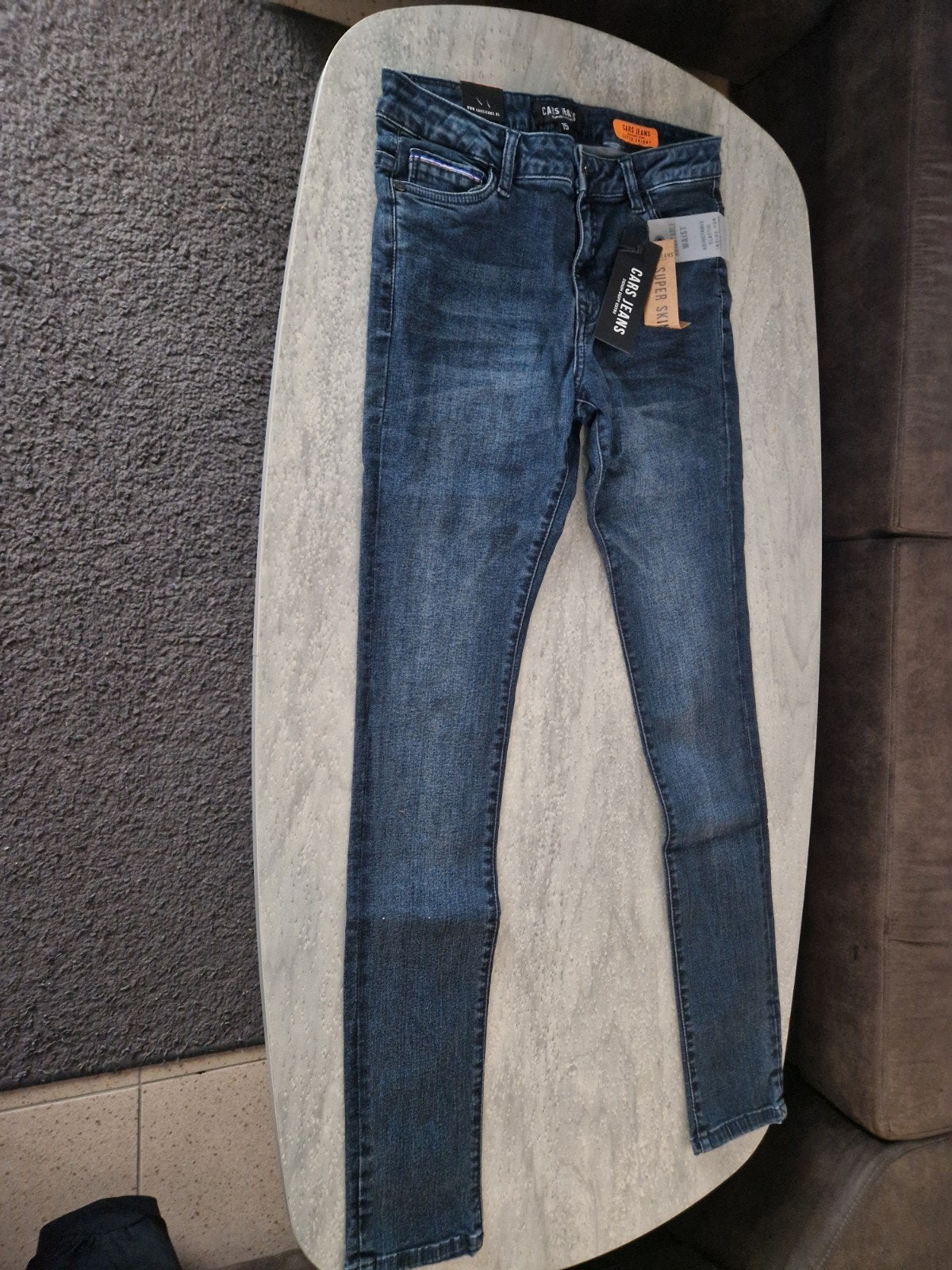 cars jeans 15 jaar, Ophalen