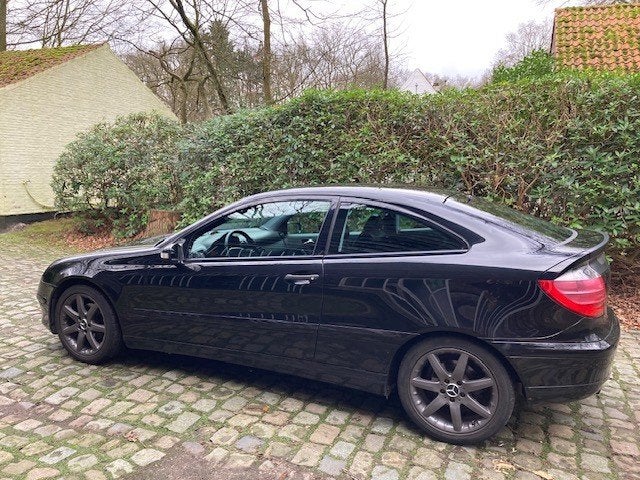 Mercedes C 180 Coupe, Auto's, Achterwielaandrijving, Zwart, 4 cilinders, Verwarmde buitenspiegels