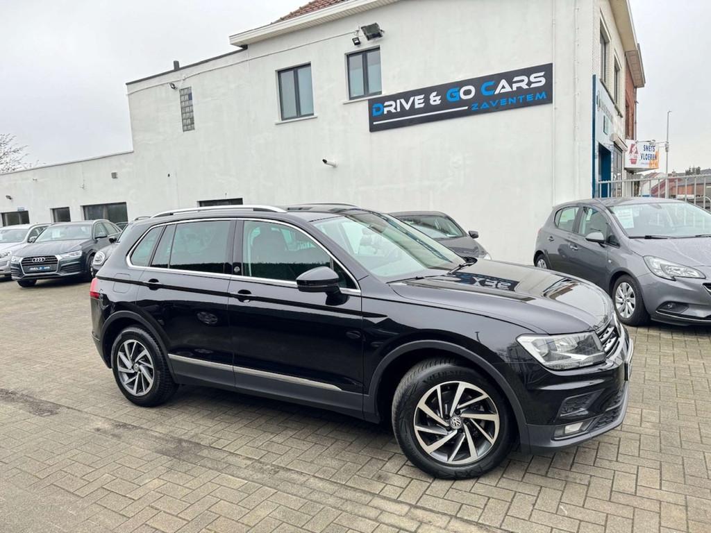 Volkswagen Tiguan 1.4 TSI Sound Edition * 1 JAAR GARANTIE *, Voorwielaandrijving, 4 deurs, Stof, Gebruikt
