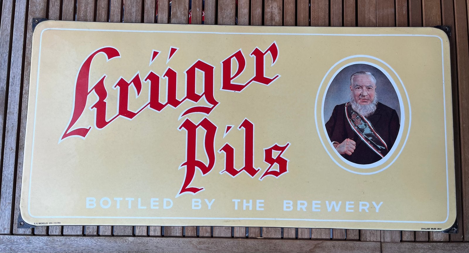 Emaille bord Kruger pils, Verzamelen, Merken en Reclamevoorwerpen, Gebruikt, Reclamebord, Ophalen