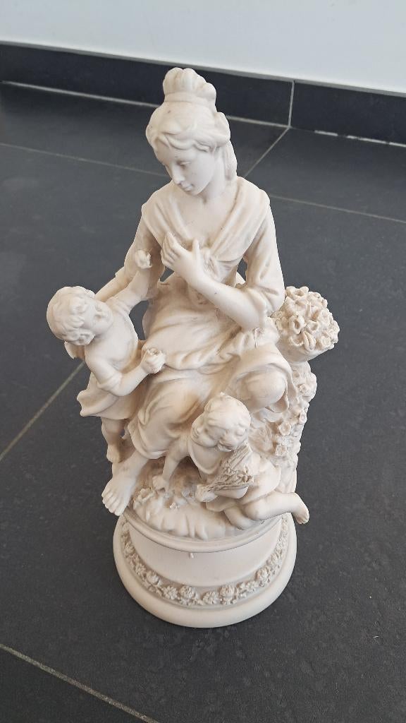 Beeld moeder met kinderen, Ophalen