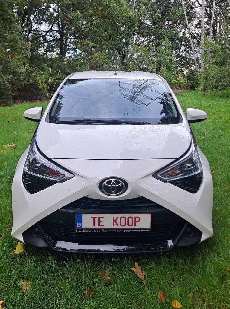 Toyota Aygo: 59.000km +airco +jaar garantie +groot nazicht!, Auto's, Voorwielaandrijving, 4 zetels, Stof, Euro 6