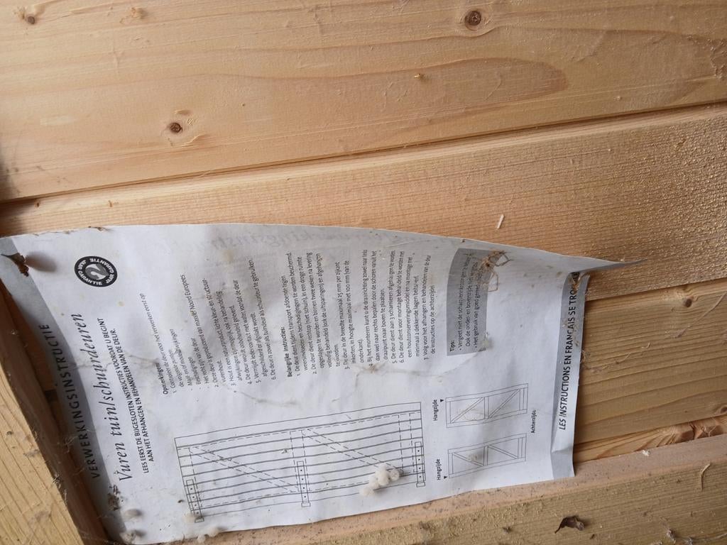Houten vuren schuurdeur buiten, Ophalen