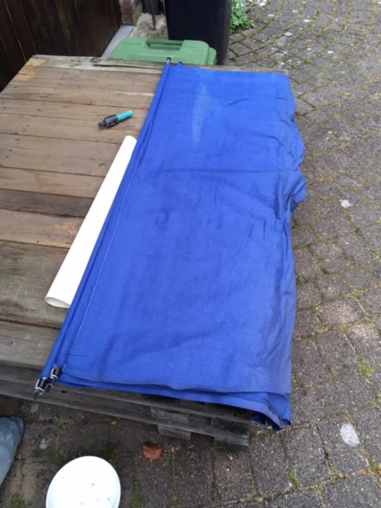 strand of schermzeil, Ophalen, Zo goed als nieuw