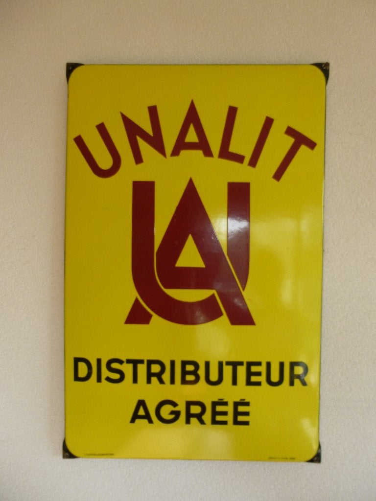 PANNEAU D'AFFICHAGE ÉMAILLÉ « UNALIT DISTRIBITEUR » DE 1950, Enlèvement ou Envoi, Comme neuf, Panneau publicitaire