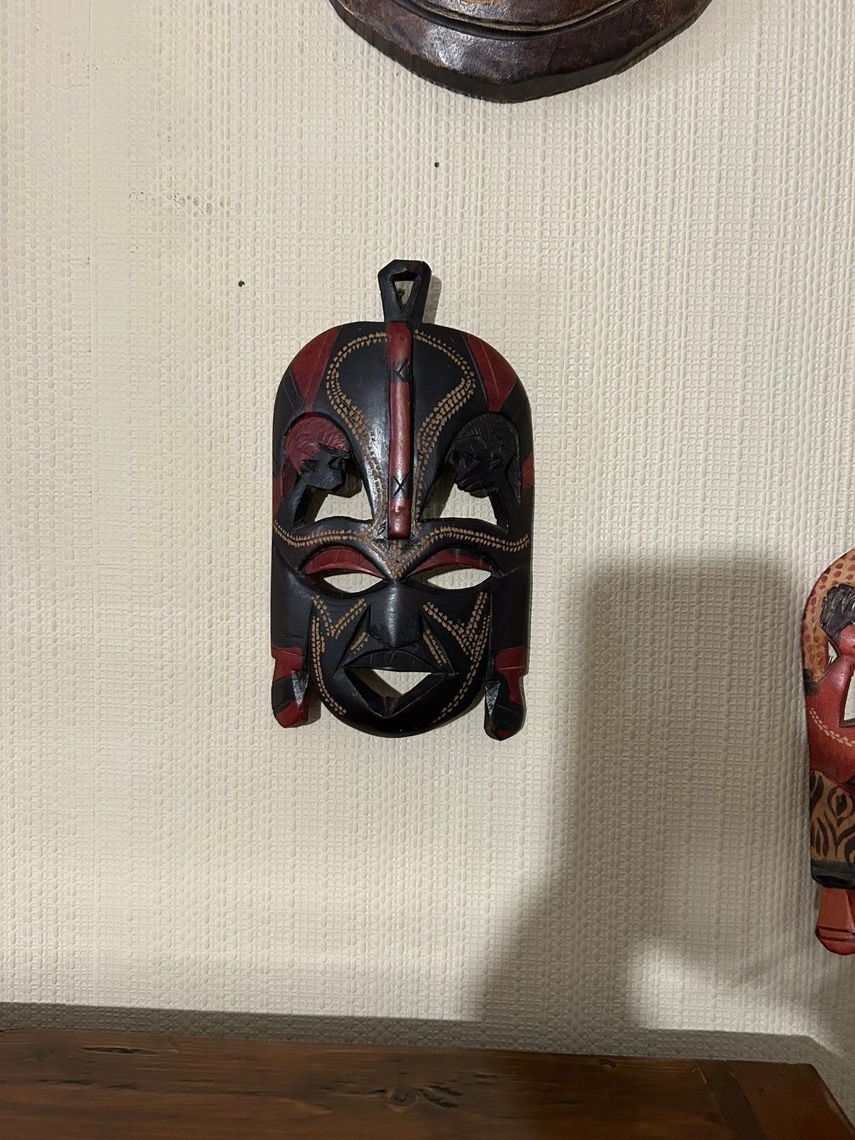 Klein Afrikaans masker, Ophalen, Masker