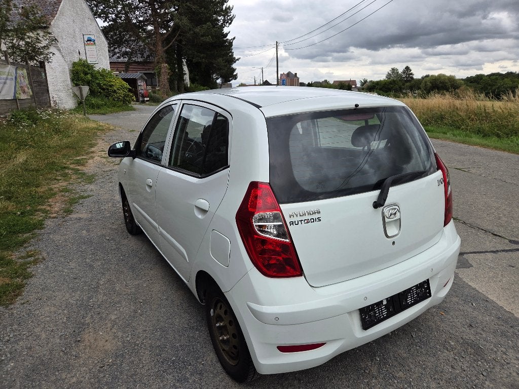 Hyundai i10 2014 94429 km garantie 1 an, Auto's, Hyundai, Voorwielaandrijving, Stof, Zwart, 4 cilinders