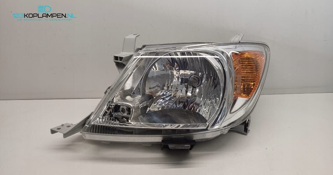 Toyota Hilux 7 koplamp links, Gebruikt, -, -, Ophalen of Verzenden